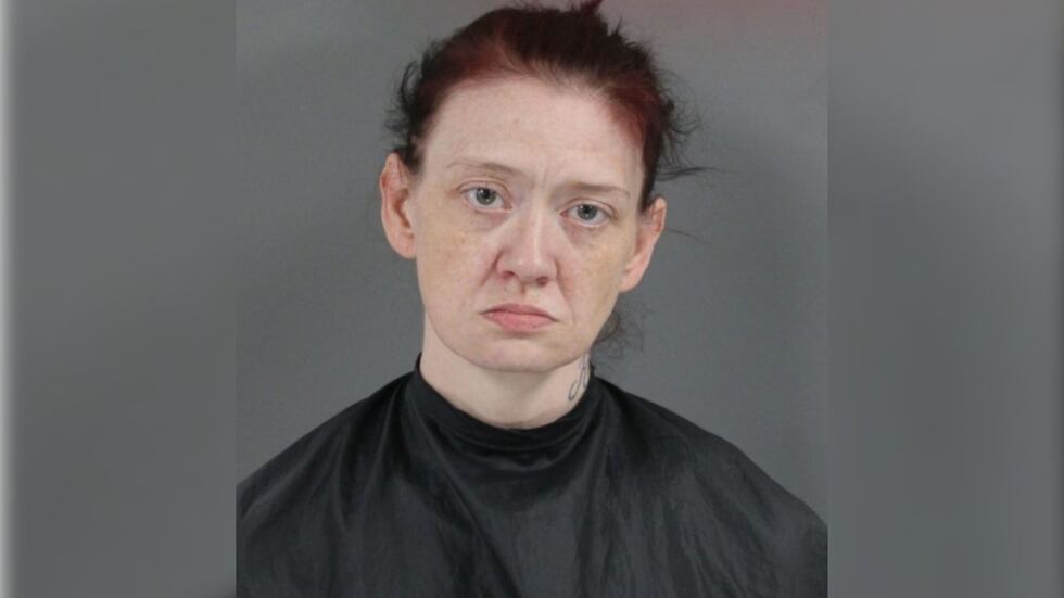Upstate woman wanted after dogs left chained together in crates outside