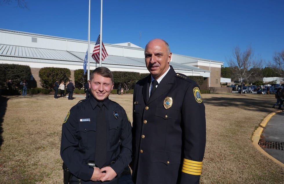 Chris DeLong, 29, with CPD Chief Skip Holbrook in 2025