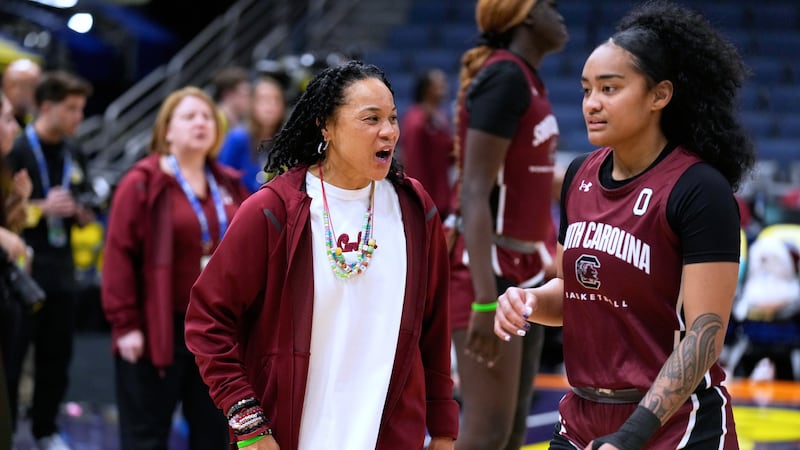 South Carolina head coach Dawn Staley talks to guard Te-Hina Paopao (0) during practice at the...