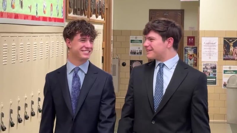 Twin brothers make history as tops of graduating class at New York high school.