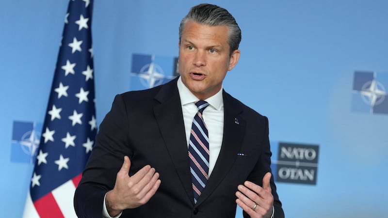 United States Defense Secretary Pete Hegseth speaks during a press statement on arrival for a...